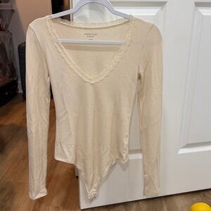 American Eagle Cream Long Sleeve Bodysuit